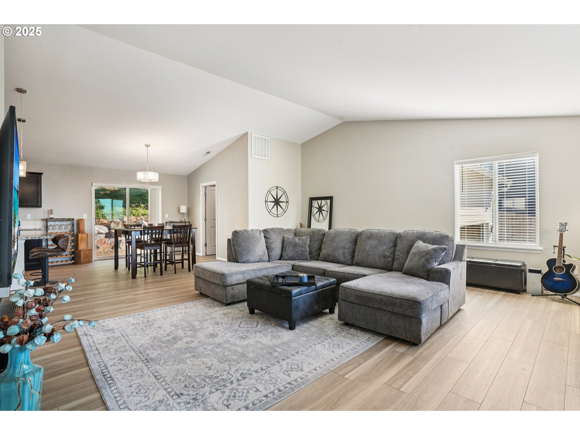 9 Curtis Lane Longview, WA 98632 - Photo 5 of 37 a living room with furniture and a wooden floor