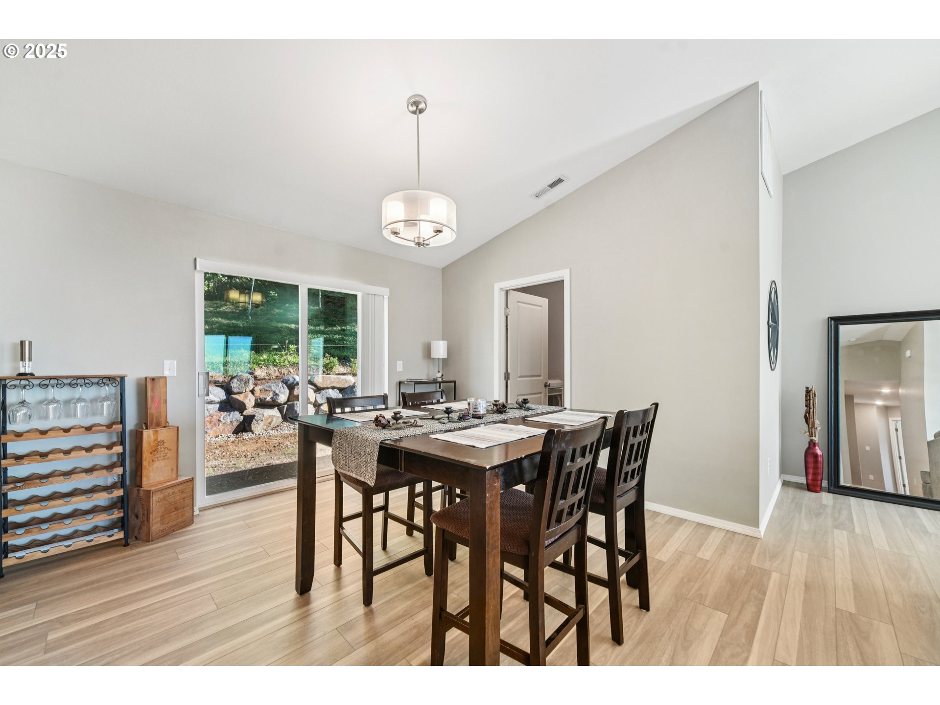9 Curtis Lane Longview, WA 98632 - Photo 9 of 37 a view of a dining room with furniture and wooden floor