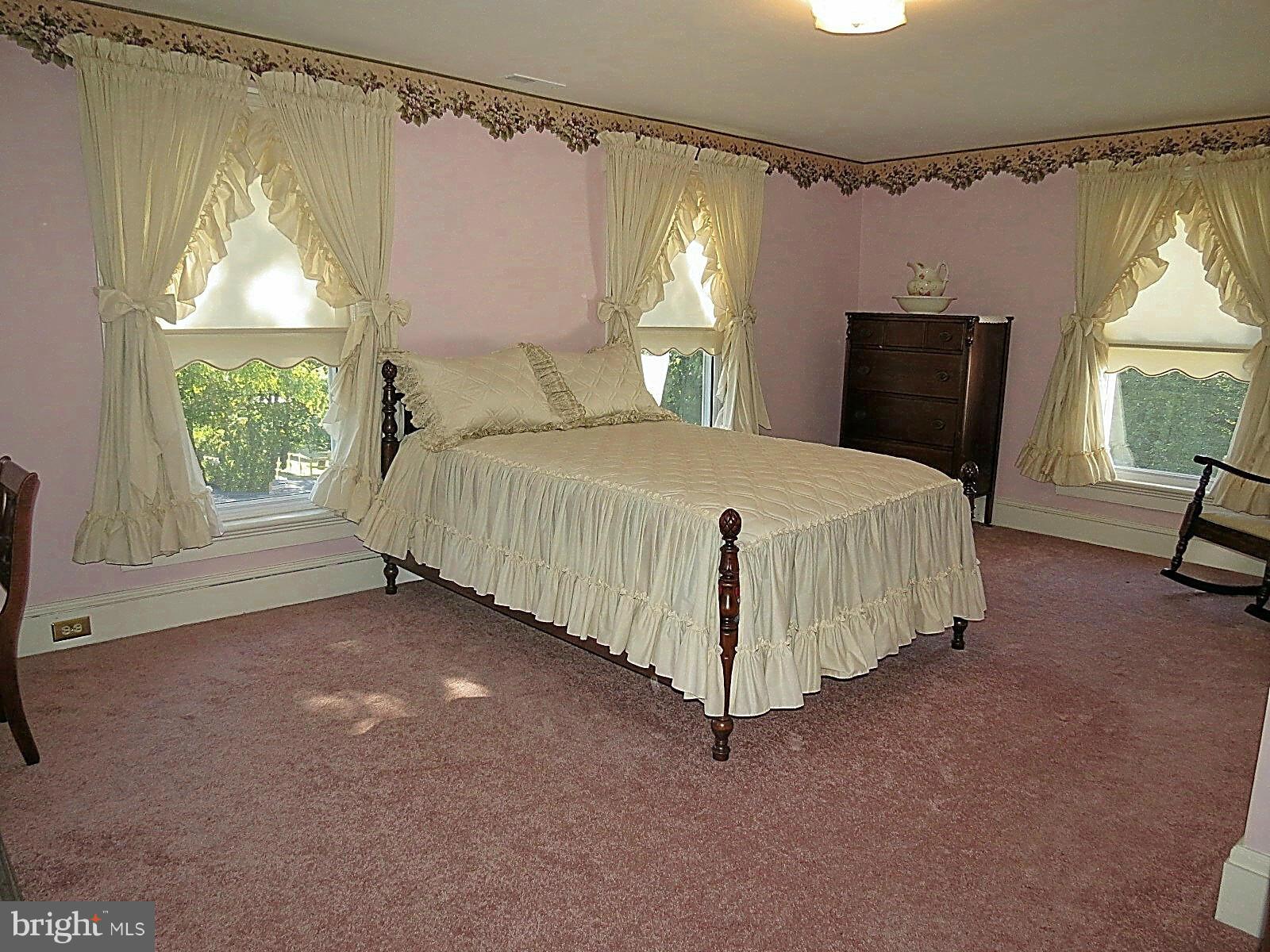 306 Buffalo Road Mount Airy, MD 21771 - Photo 22 of 30 a bedroom with a bed chair and window