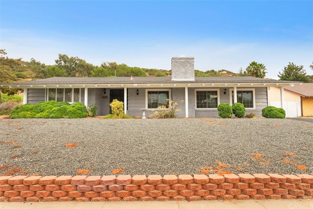 31175 Old River Road Bonsall, CA 92003 - Photo 1 of 1 a front view of a house with a yard