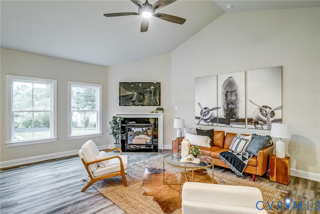 2301 Larkwood Road Henrico, VA 23294 - Photo 14 of 23 a living room with furniture and a fireplace