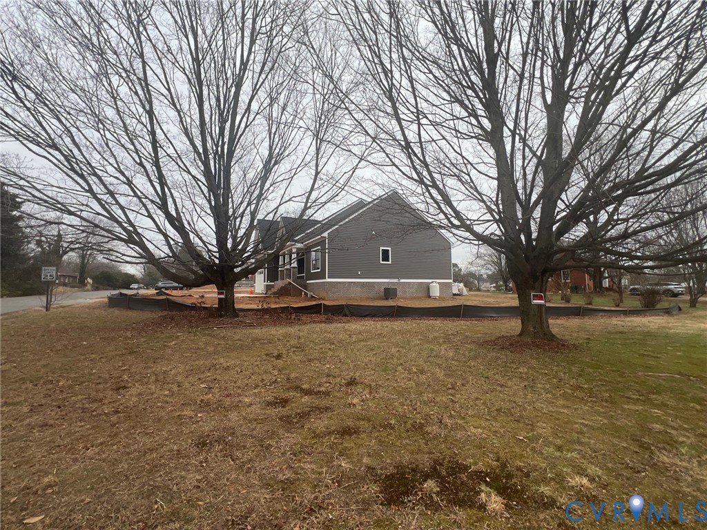 2301 Larkwood Road Henrico, VA 23294 - Photo 23 of 23 a front view of a house with a yard