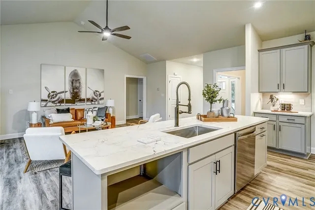 a view of a dining room with furniture and window