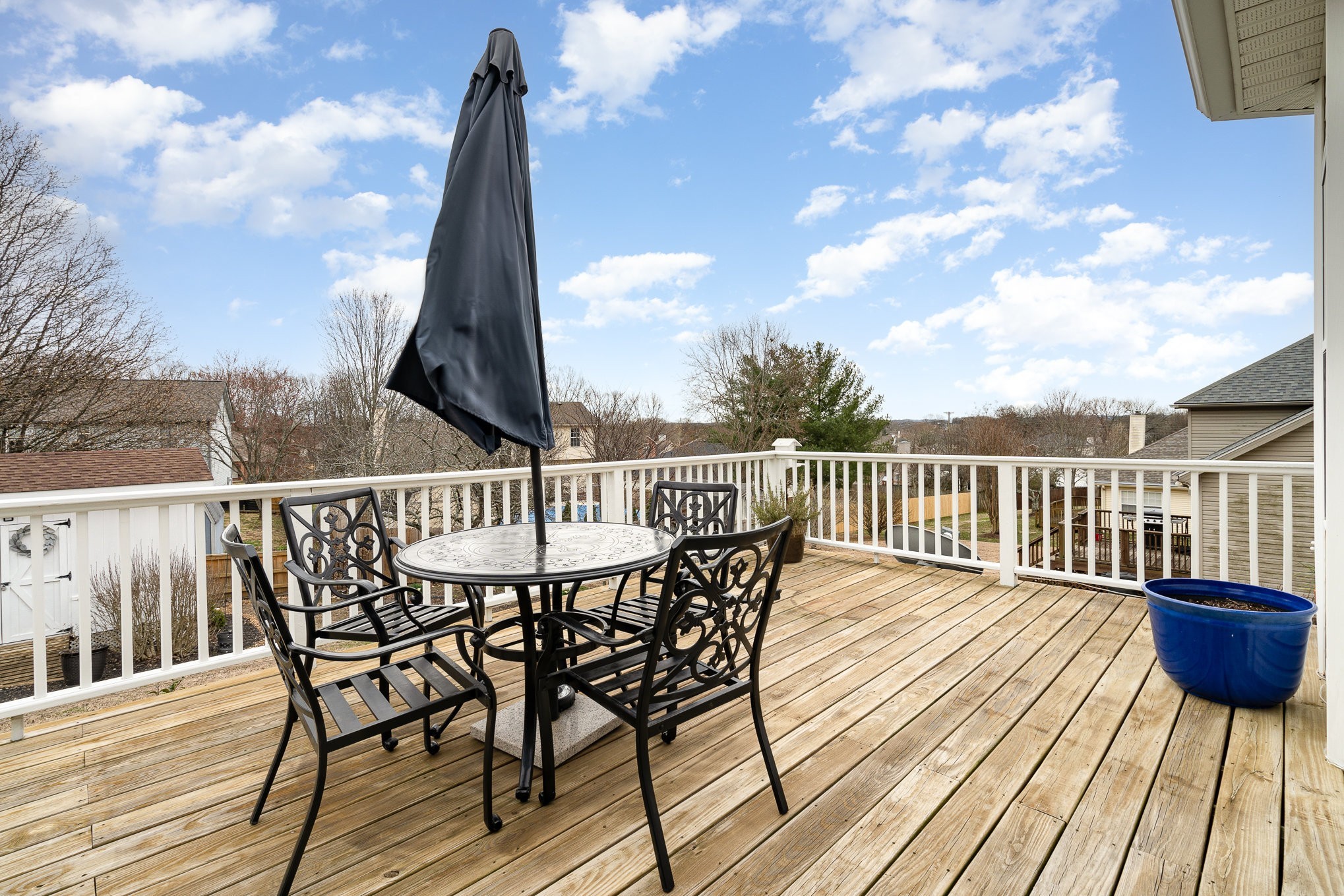 2408 Audelia Way Spring Hill, TN 37174 - Photo 15 of 25 a view of a deck with a chair on the roof deck