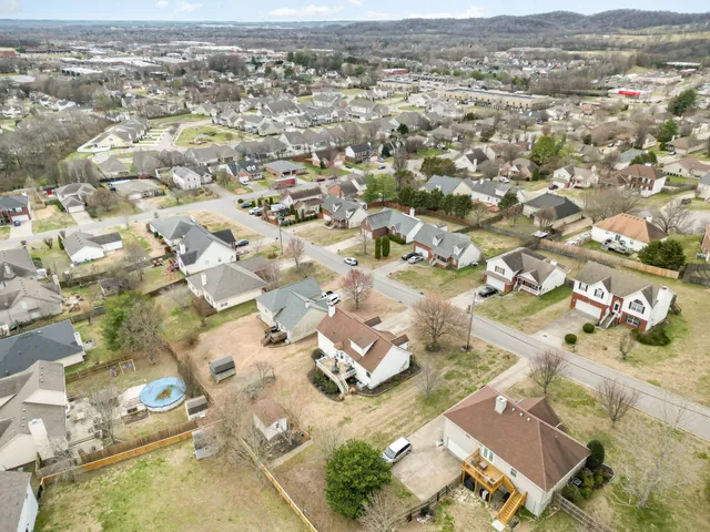 an aerial view of residential house with parking space