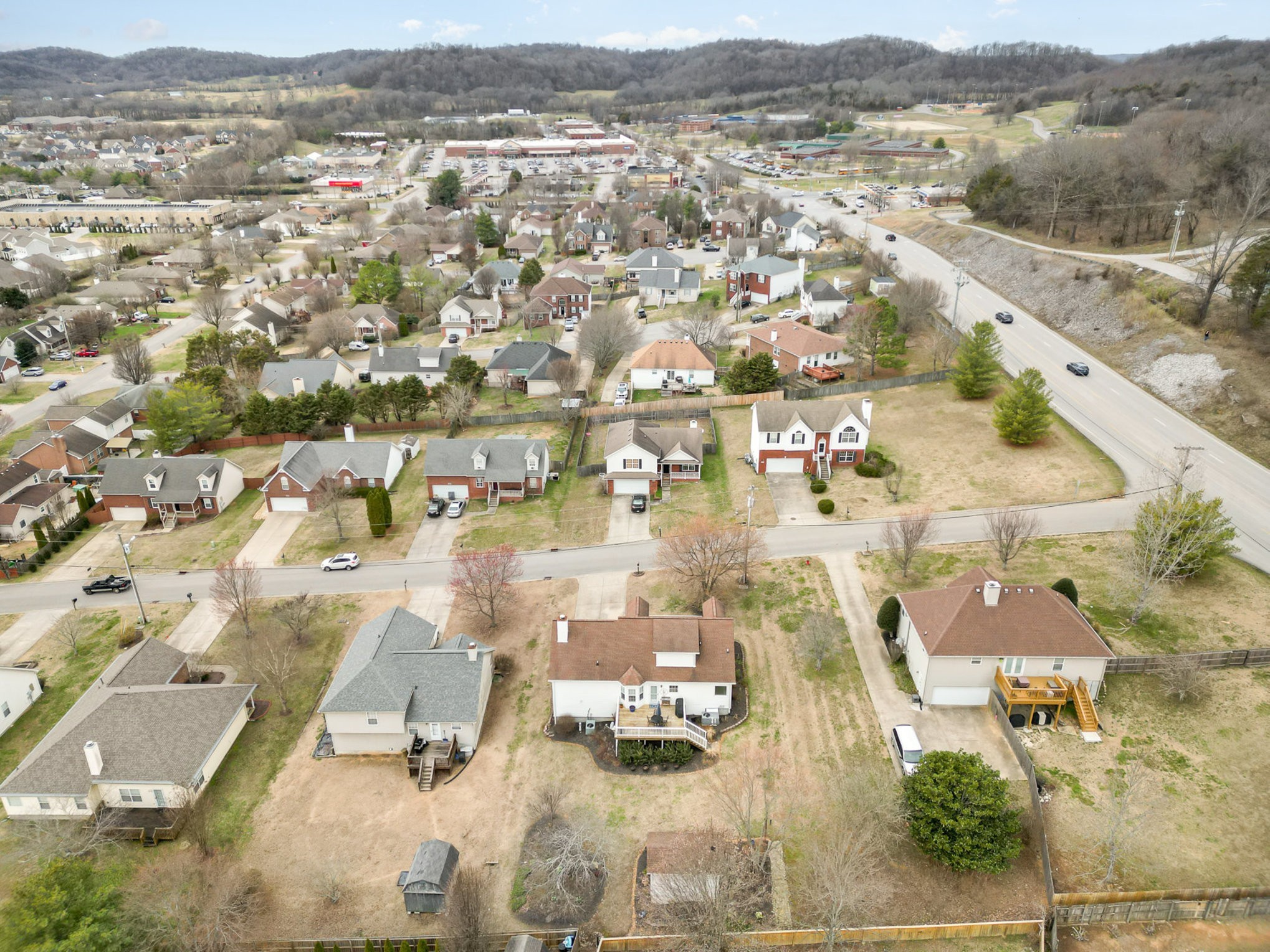 2408 Audelia Way Spring Hill, TN 37174 - Photo 21 of 25 an aerial view of residential building and parking space