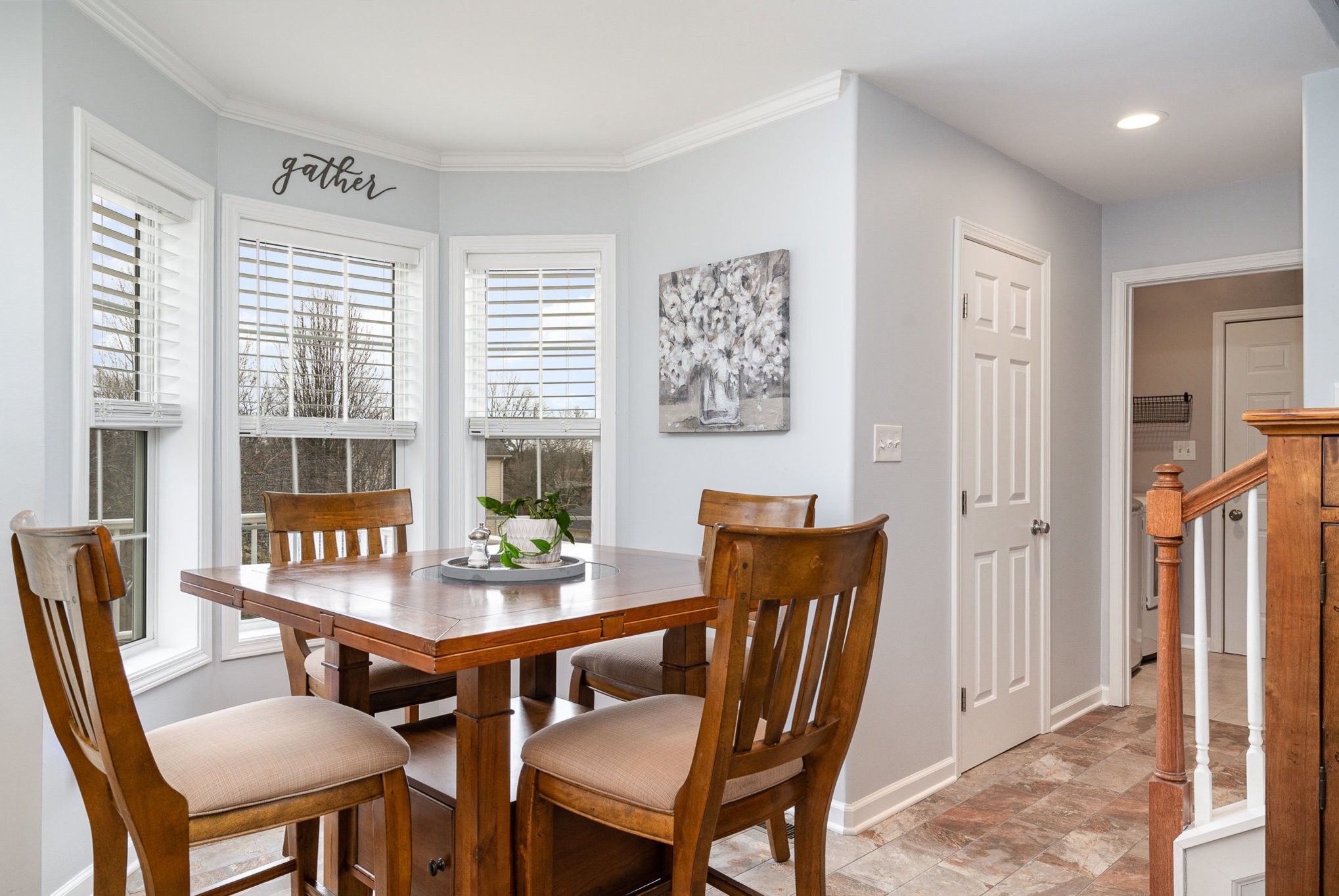 2408 Audelia Way Spring Hill, TN 37174 - Photo 4 of 25 a view of a dining room with furniture window and wooden floor
