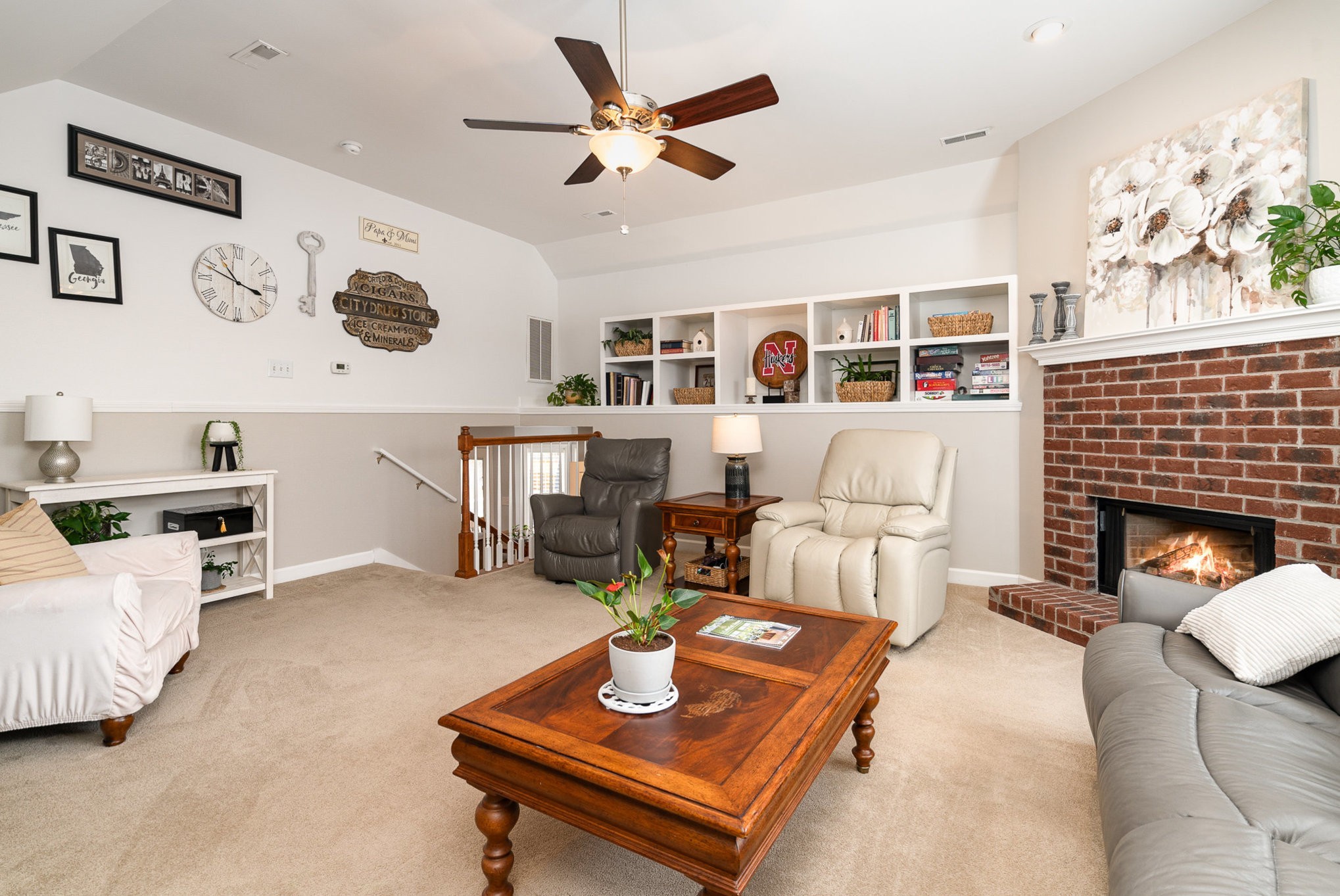 2408 Audelia Way Spring Hill, TN 37174 - Photo 8 of 25 a living room with furniture and a fireplace