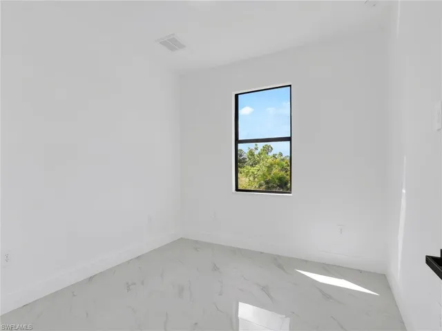 an empty room with a window
