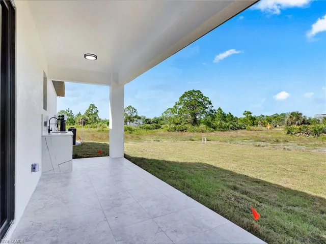 a view of a balcony with an ocean view