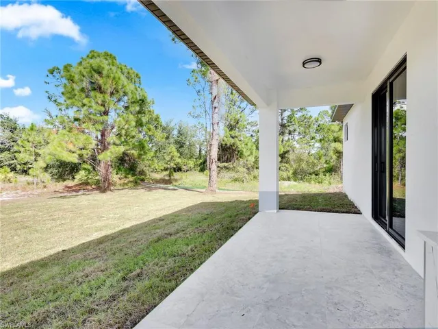 a view of a yard with an outdoor space