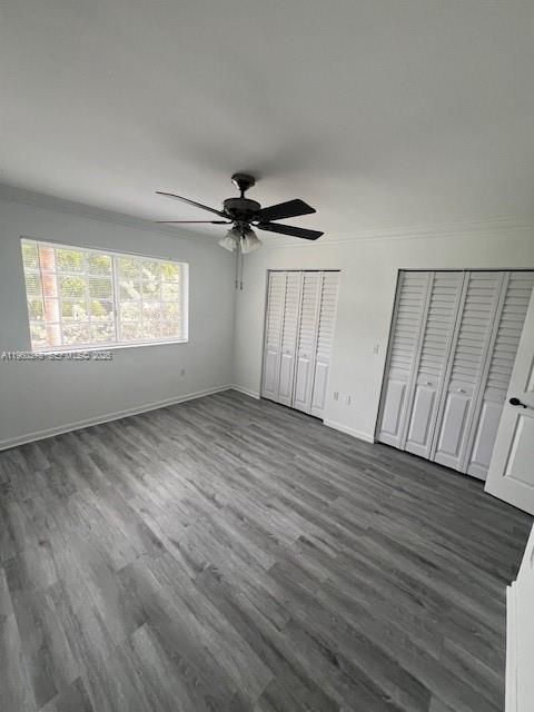 2103 Renaissance Boulevard, Unit 307 Miramar, FL 33025 - Photo 19 of 32 a view of an empty room with wooden floor and a window