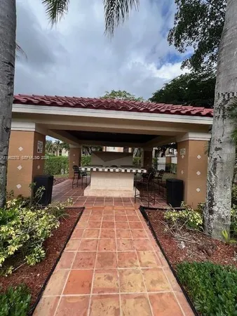 a view of a terrace with a garden