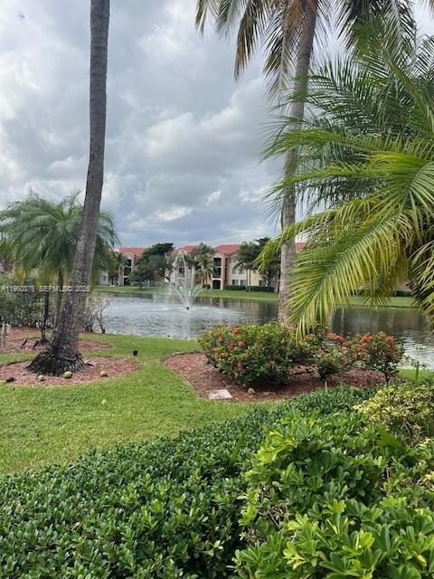2103 Renaissance Boulevard, Unit 307 Miramar, FL 33025 - Photo 28 of 32 a view of a garden