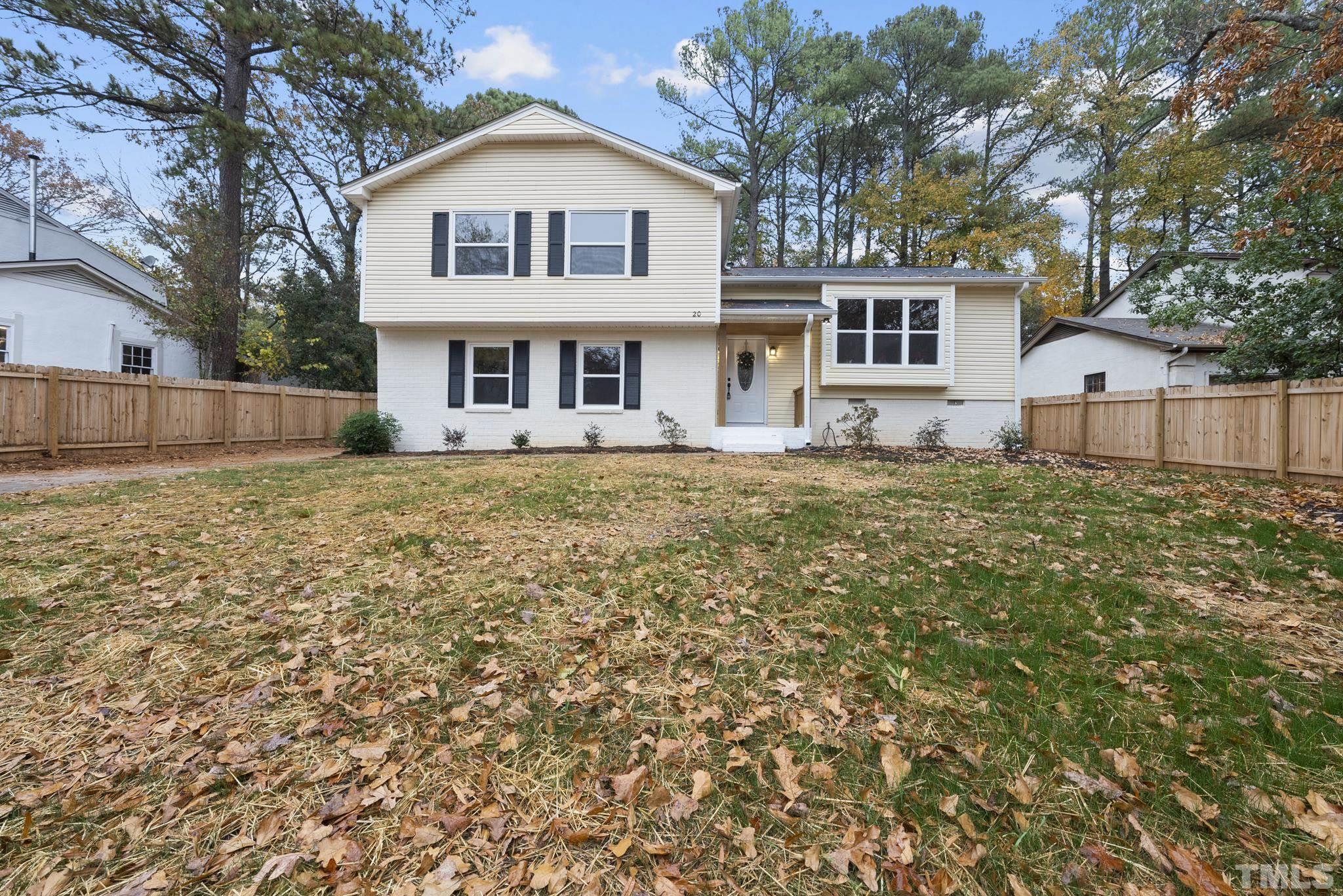 20 Lynn Road Raleigh, NC 27609 - Photo 2 of 29 a front view of a house with a yard