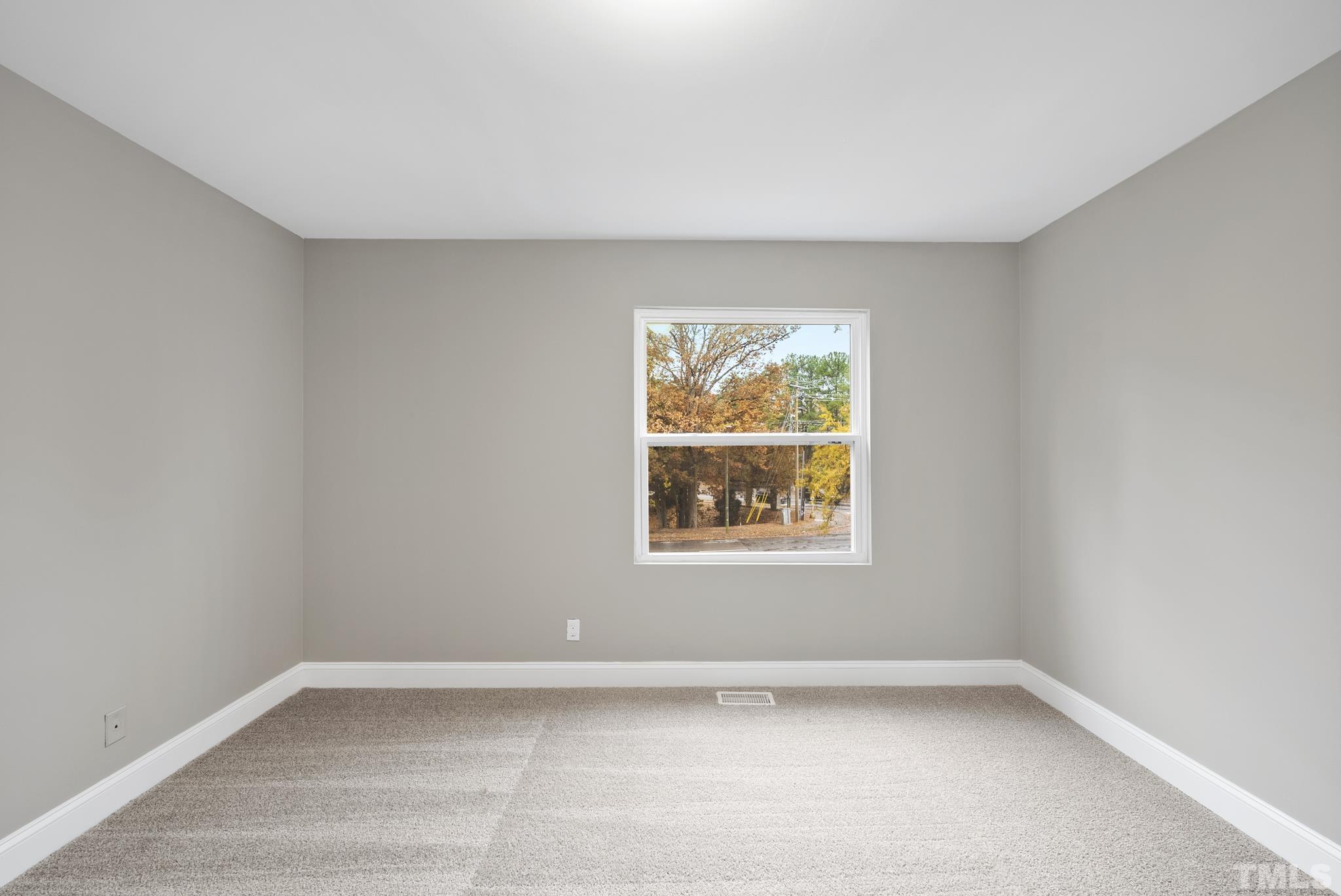 20 Lynn Road Raleigh, NC 27609 - Photo 21 of 29 an empty room with a window