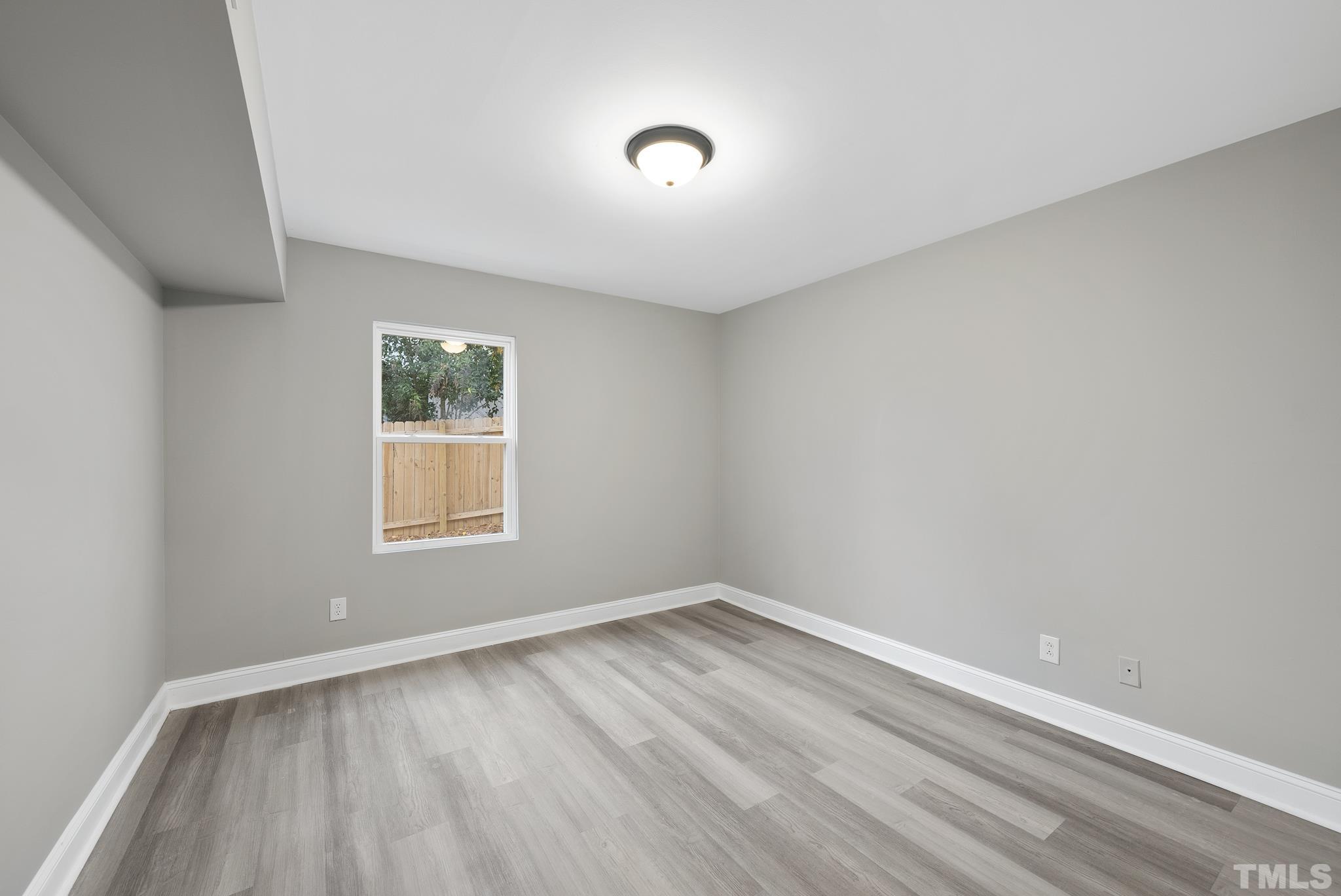 20 Lynn Road Raleigh, NC 27609 - Photo 27 of 29 an empty room with a window