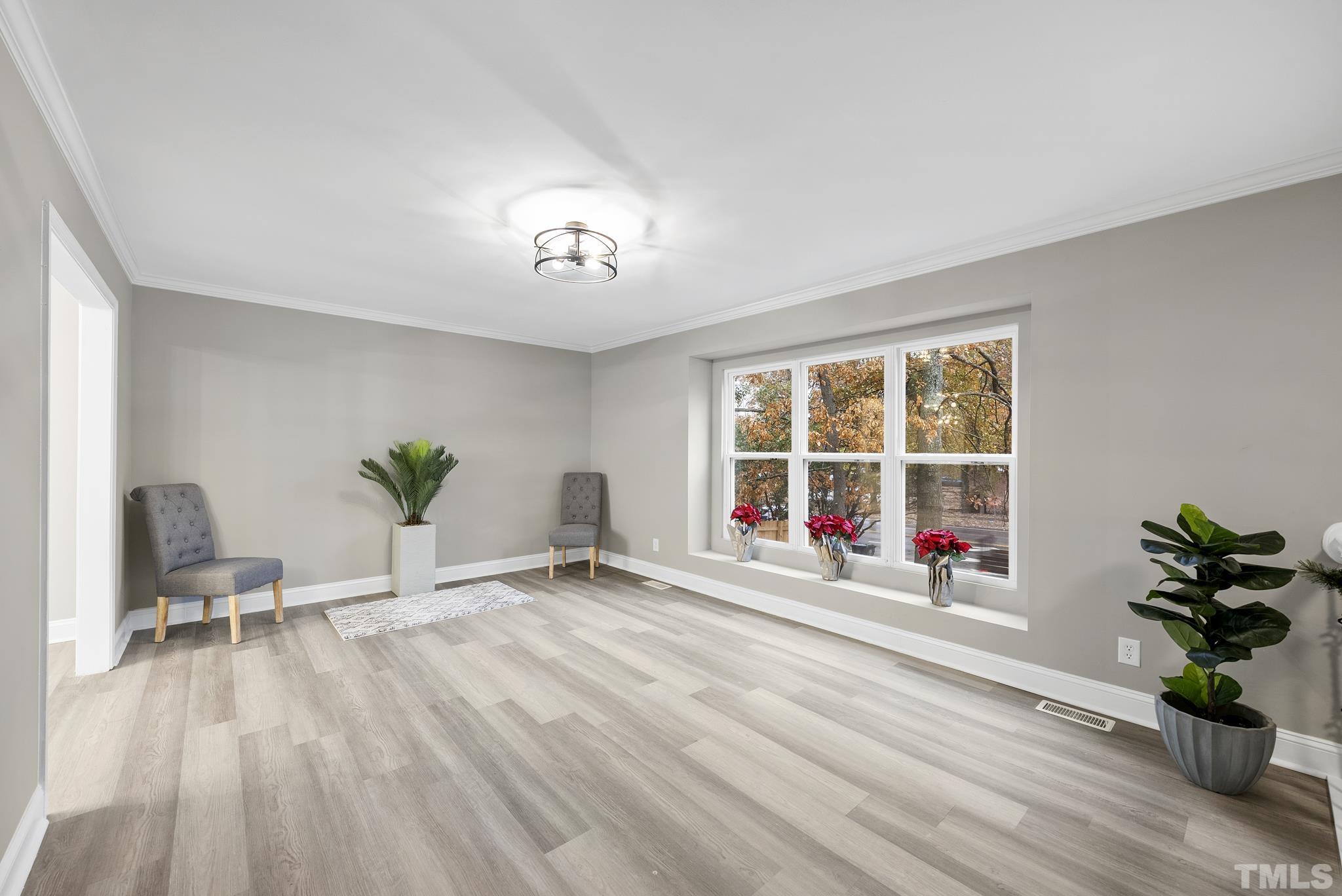 20 Lynn Road Raleigh, NC 27609 - Photo 7 of 29 a view of an empty room with a window