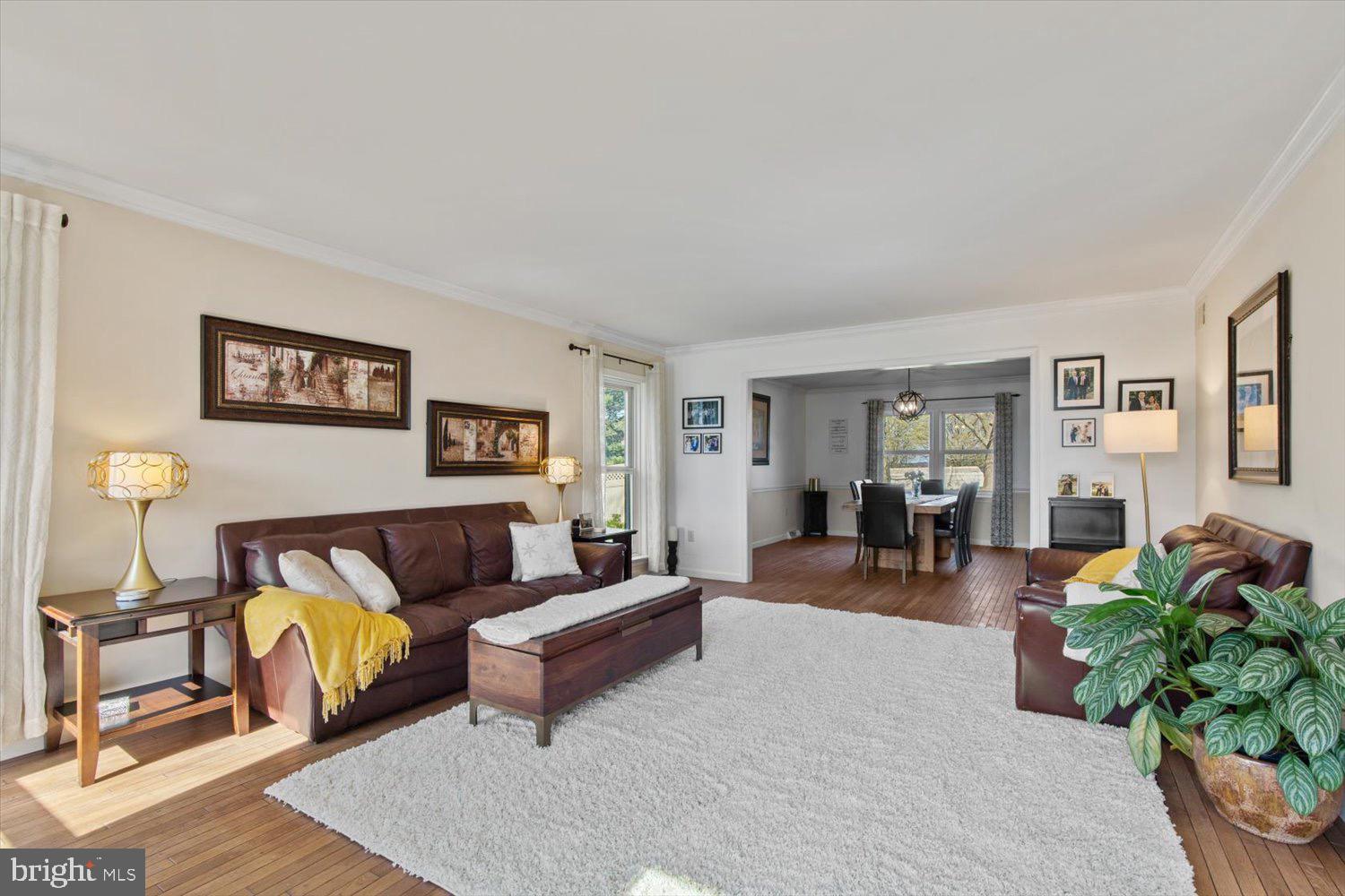 702 Buckwood Lane Lititz, PA 17543 - Photo 15 of 64 a living room with furniture and a wooden floor