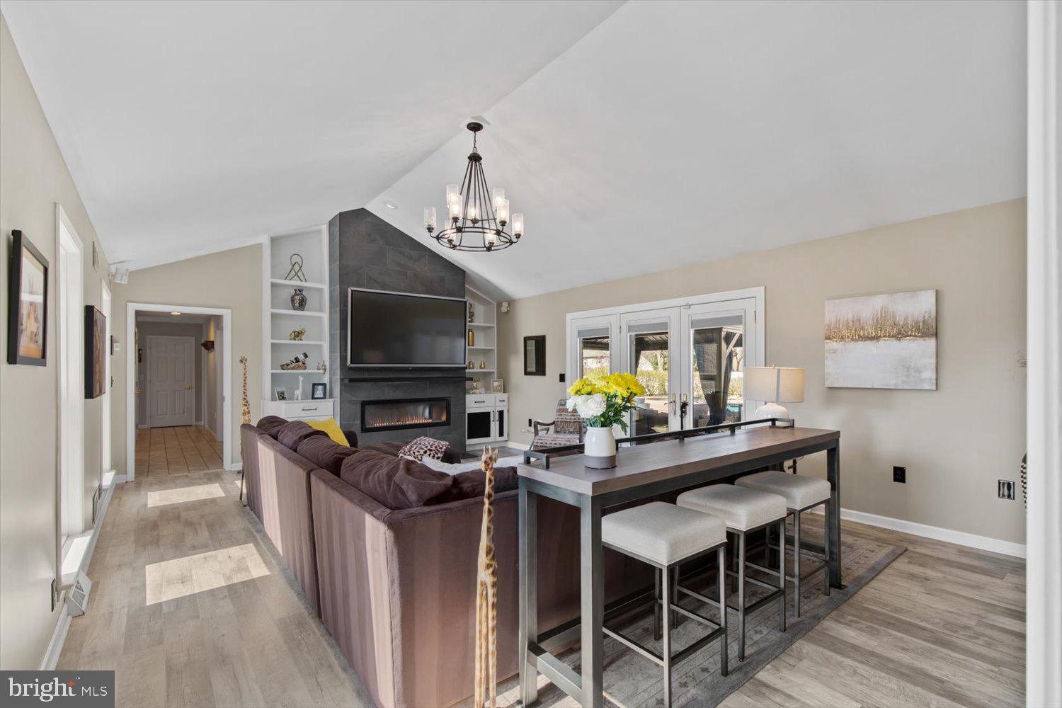 702 Buckwood Lane Lititz, PA 17543 - Photo 16 of 64 a living room with furniture and a flat screen tv