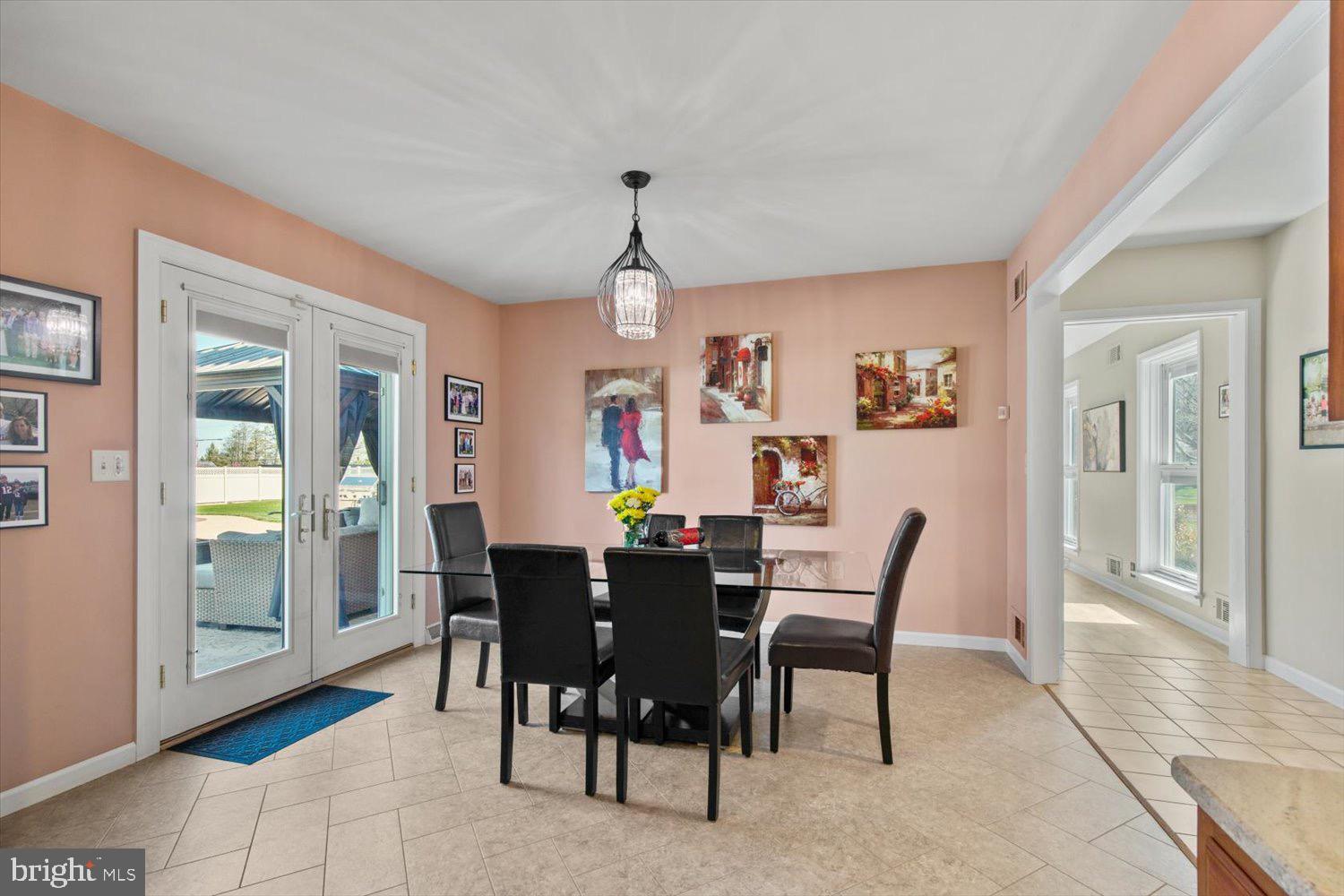 702 Buckwood Lane Lititz, PA 17543 - Photo 22 of 64 a view of a dining room with furniture and window