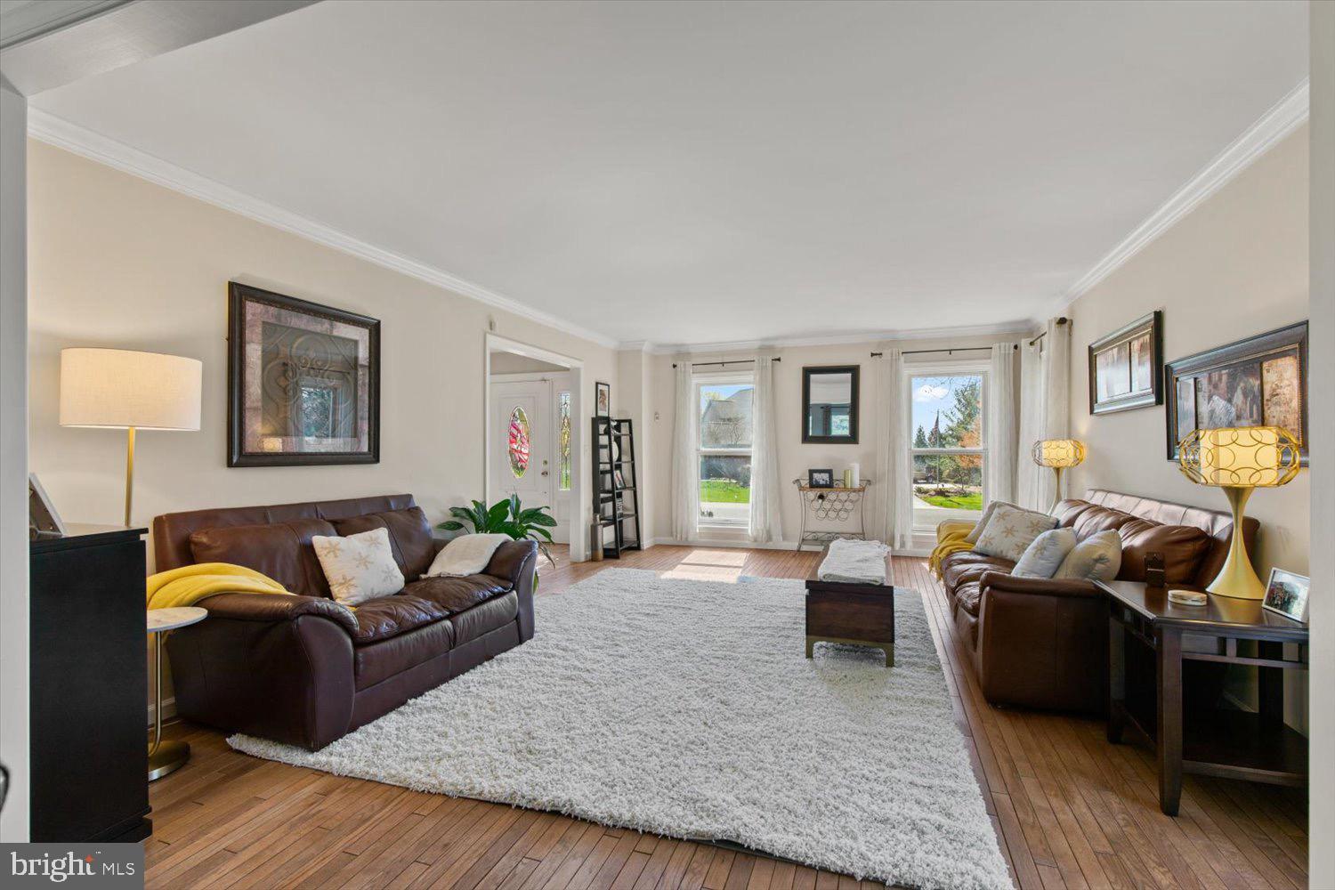 702 Buckwood Lane Lititz, PA 17543 - Photo 24 of 64 a living room with furniture and a flat screen tv