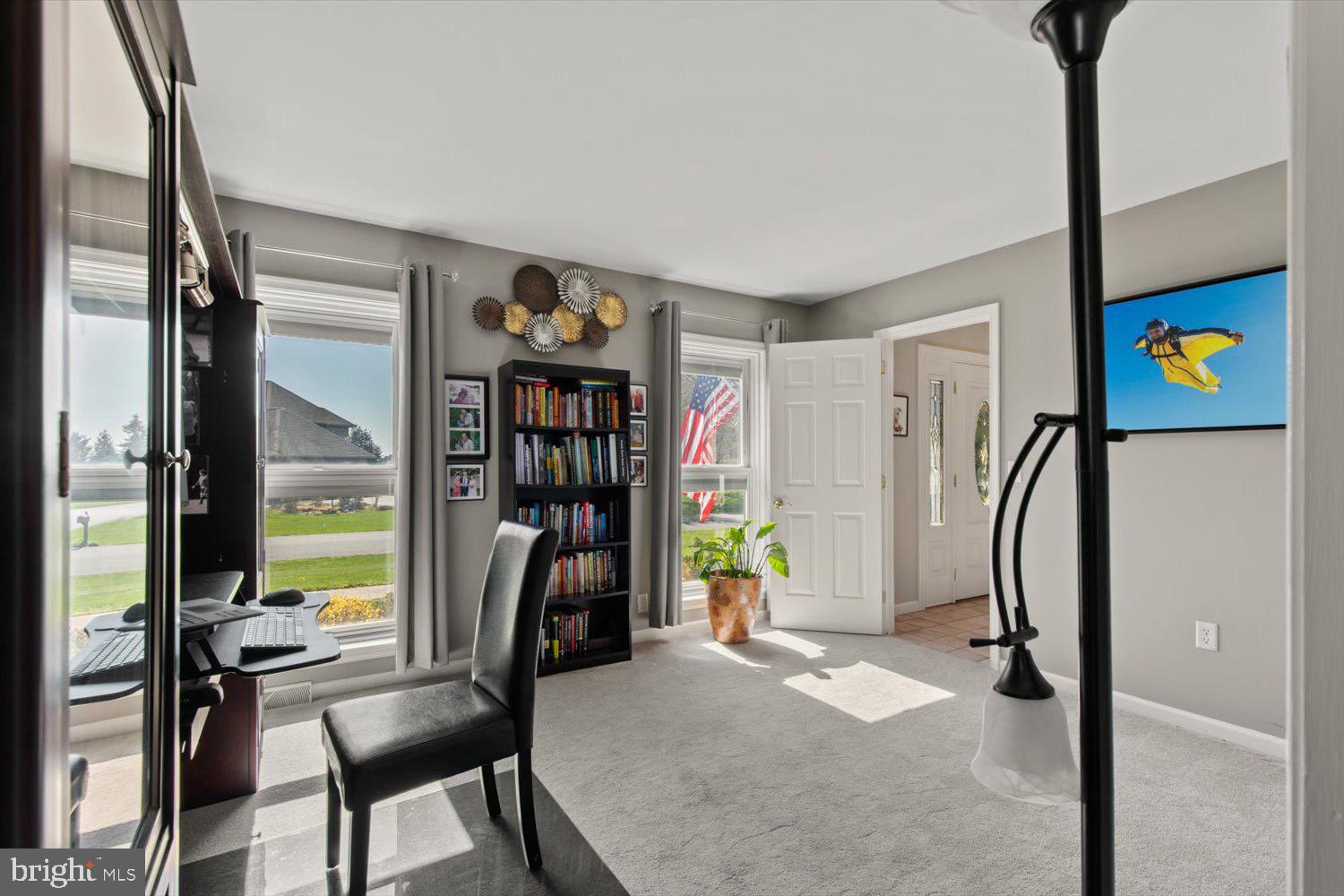 702 Buckwood Lane Lititz, PA 17543 - Photo 25 of 64 a view of a livingroom with furniture and a window