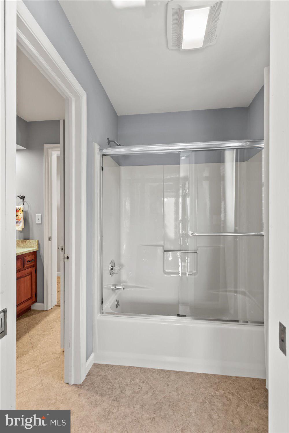 702 Buckwood Lane Lititz, PA 17543 - Photo 27 of 64 a bathroom with a glass shower door