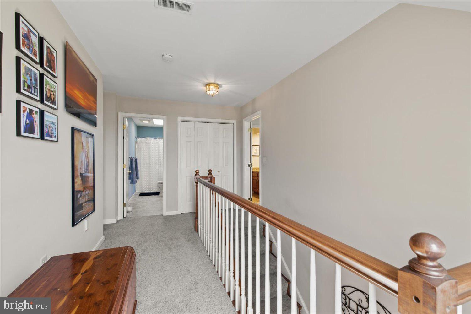 702 Buckwood Lane Lititz, PA 17543 - Photo 30 of 64 a view of a hallway with windows