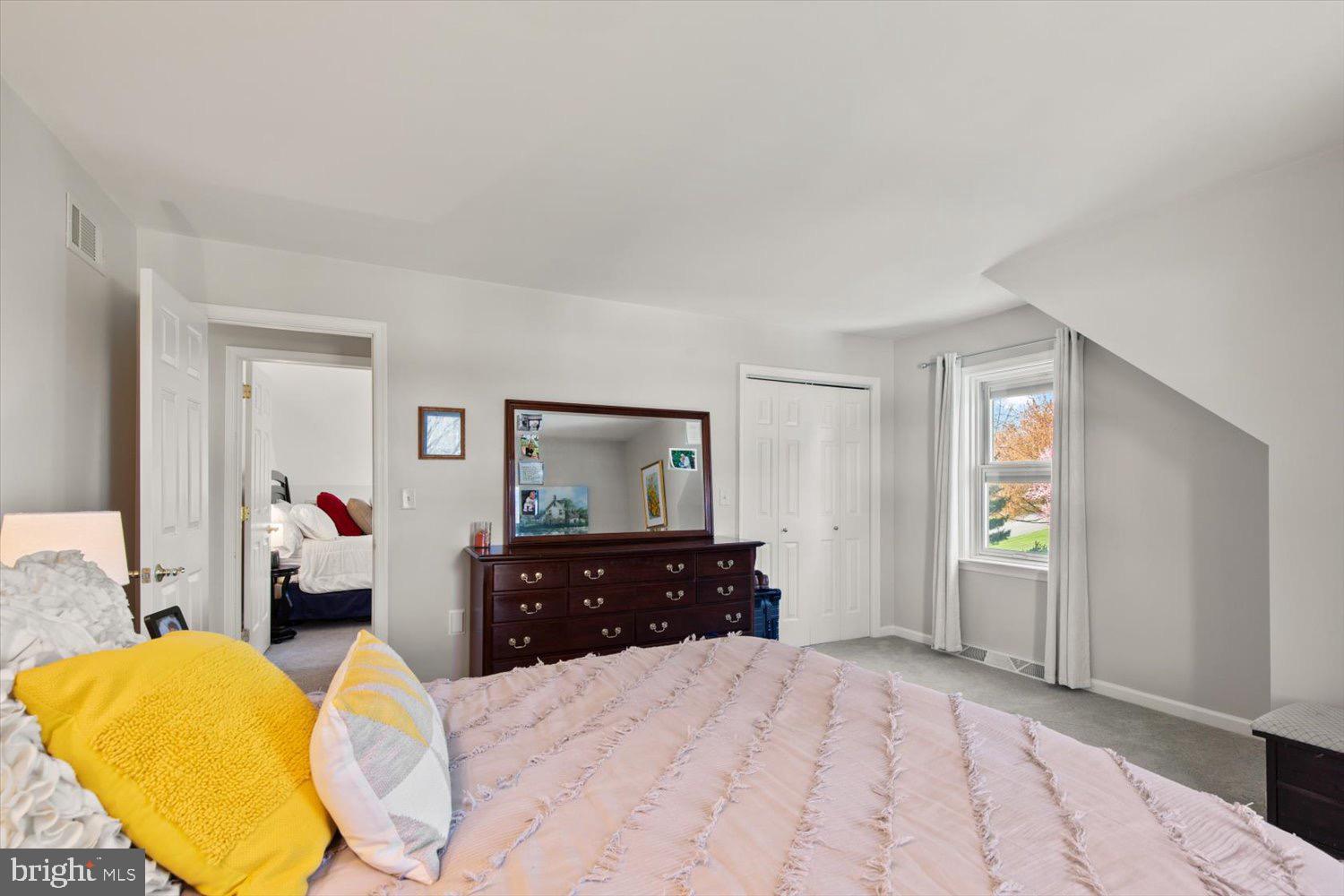 702 Buckwood Lane Lititz, PA 17543 - Photo 40 of 64 a bedroom with a bed and wooden floor