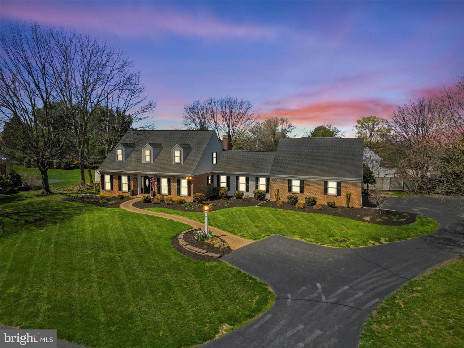 702 Buckwood Lane Lititz, PA 17543 - Photo 60 of 64 a view of a big house with a big yard