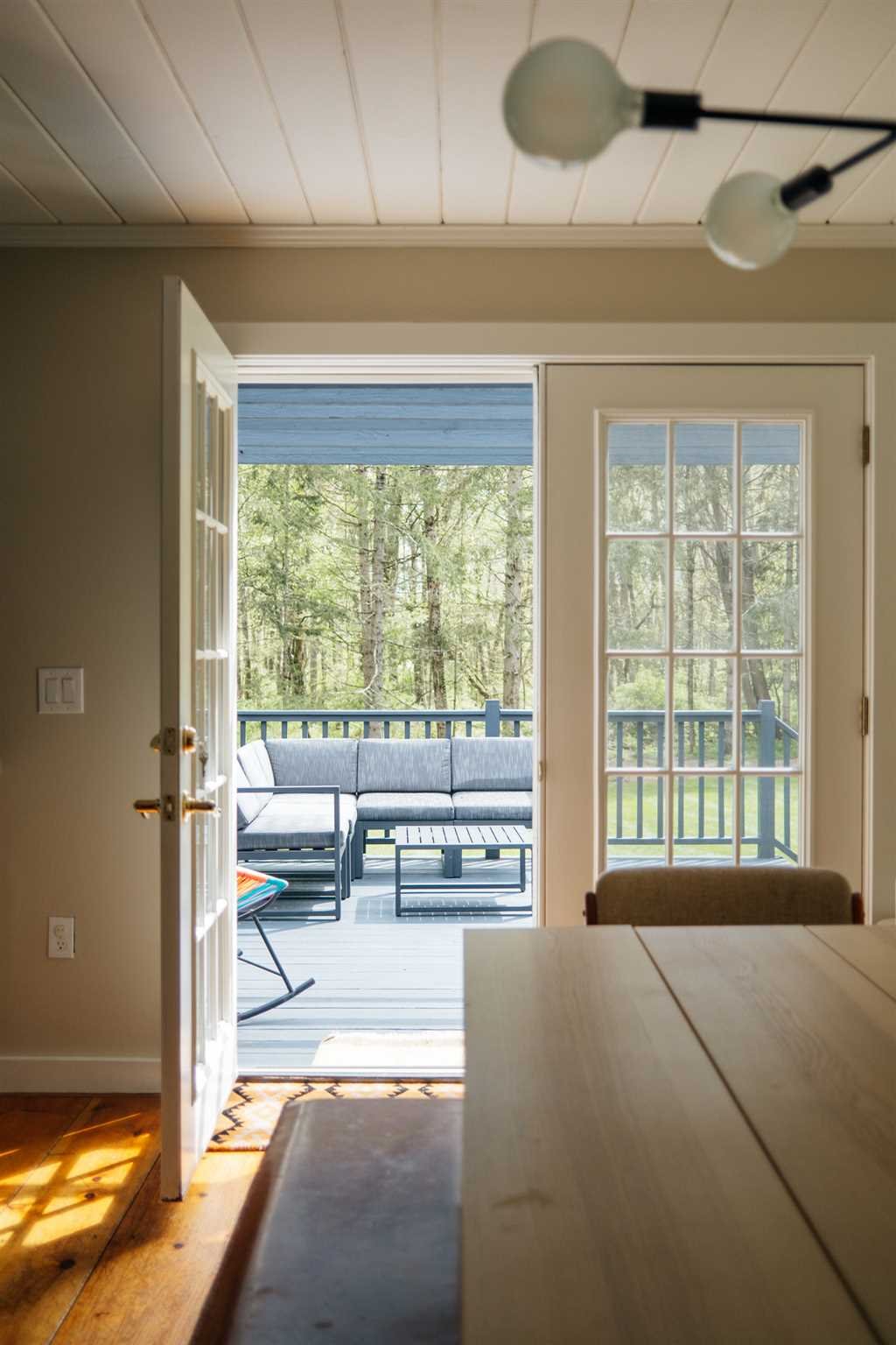 89 Benner Road Red Hook, NY 12571 - Photo 13 of 33 a spacious bedroom with a large bed and a large window