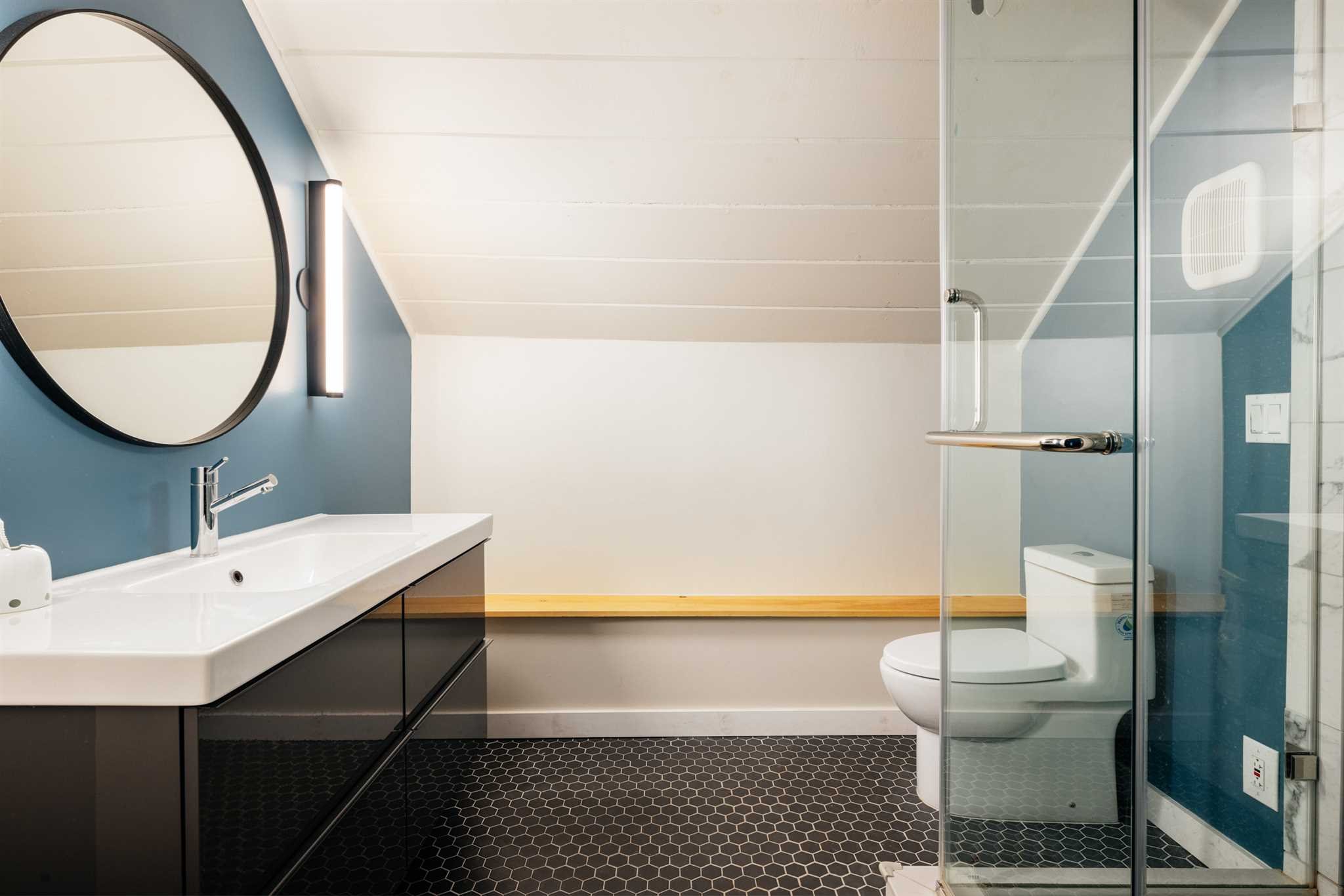 89 Benner Road Red Hook, NY 12571 - Photo 21 of 33 a bathroom with a sink a toilet and a mirror