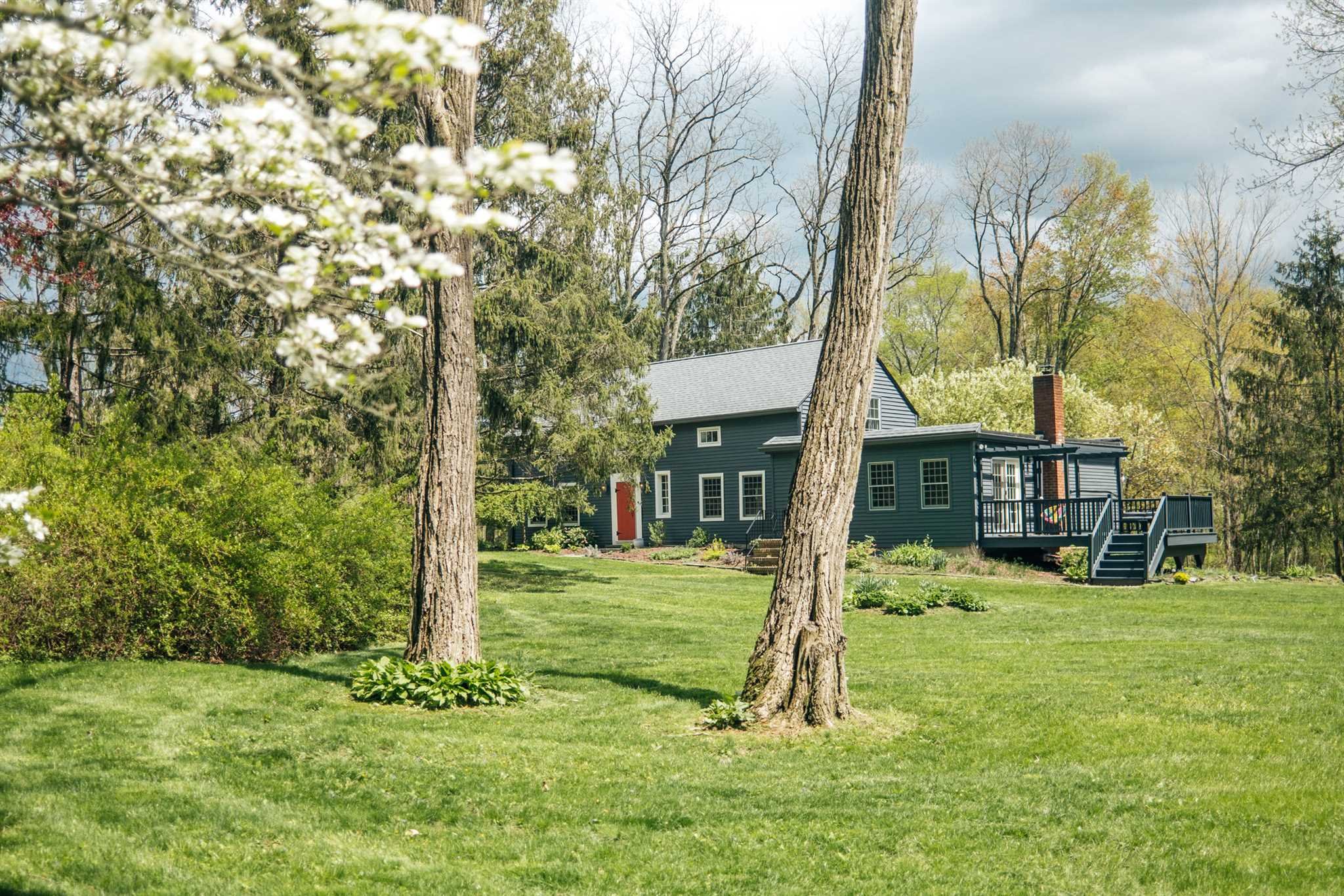 89 Benner Road Red Hook, NY 12571 - Photo 28 of 33 a front view of a house with a yard