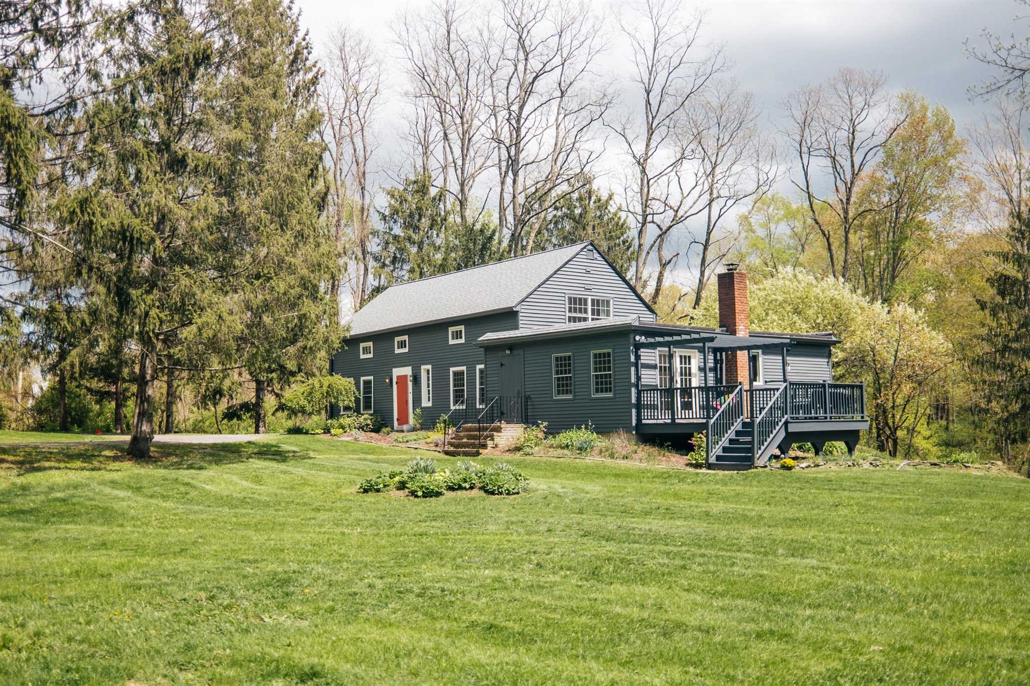 89 Benner Road Red Hook, NY 12571 - Photo 33 of 33 a front view of a house with a yard