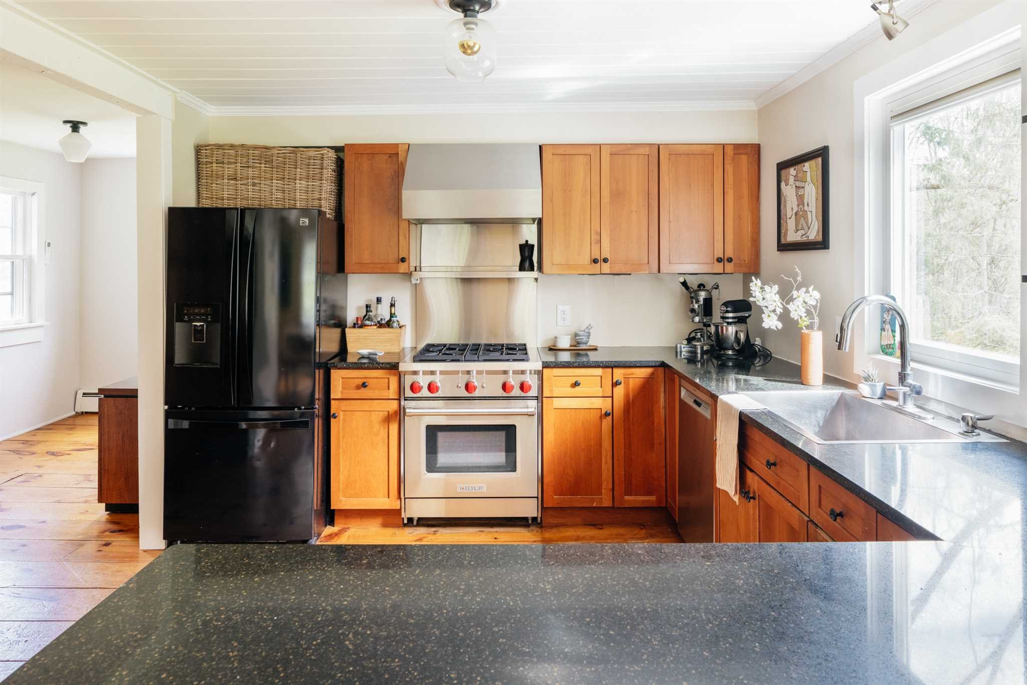 89 Benner Road Red Hook, NY 12571 - Photo 9 of 33 a kitchen with stainless steel appliances granite countertop a refrigerator a sink a stove a microwave and island