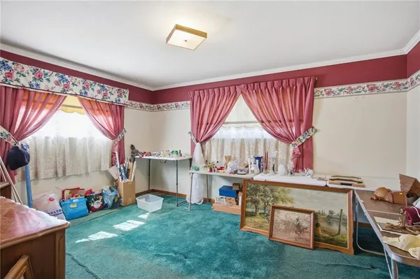 a view of a kitchen with cabinets and outdoor view