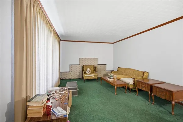 a room with furniture and a window