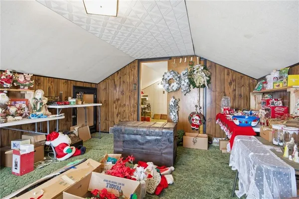 a living room with lots of baby toys