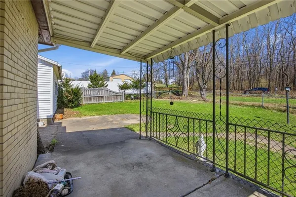 a view of backyard with green space