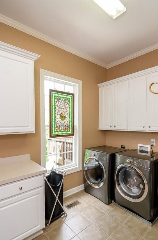 2913 Elmfield Street Raleigh, NC 27614 - Photo 12 of 30 Laundry Room with Sink, Ironing Center and Storage. Laundry Room