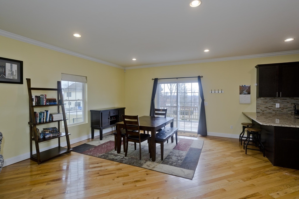 48 Mountain Avenue West Springfield, MA 01089 - Photo 11 of 39 a view of a dining room with furniture and wooden floor