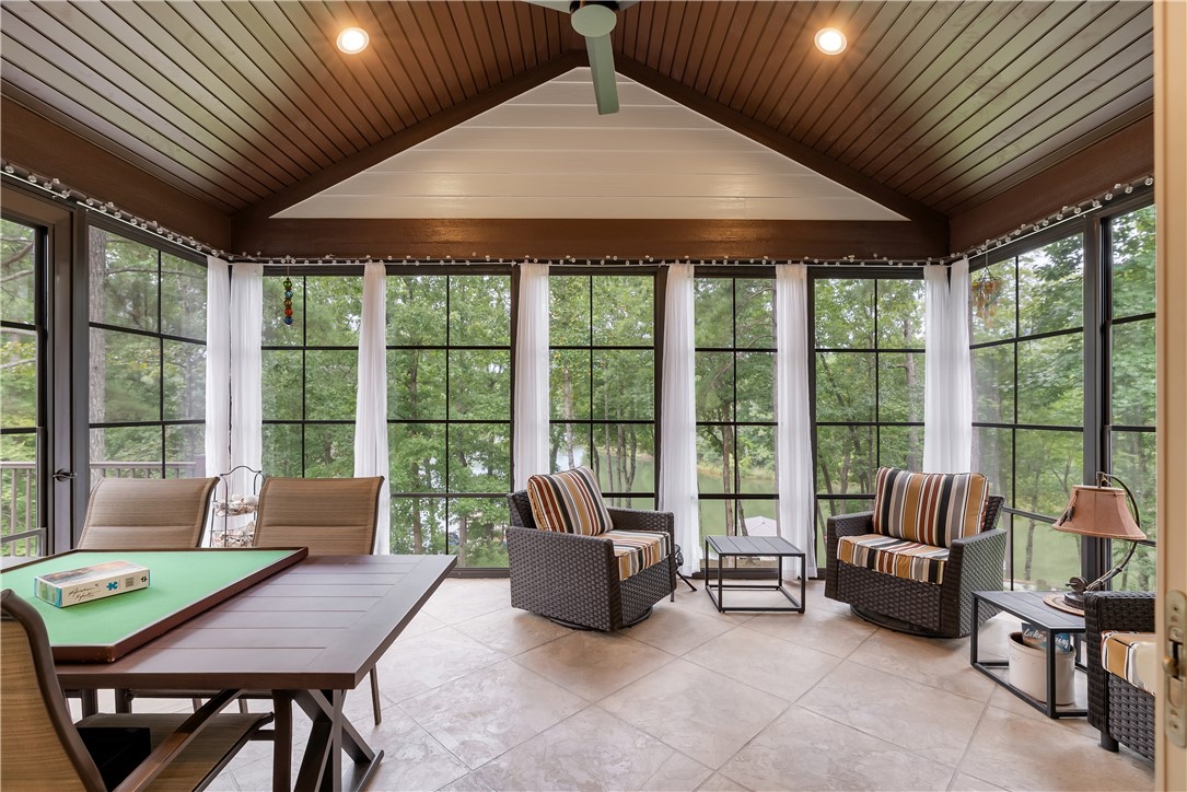 329 High Hampton Road Salem, SC 29676 - Photo 8 of 47 A vaulted wood-paneled ceiling and tiled floors define this inviting screened porch over looking the trees.