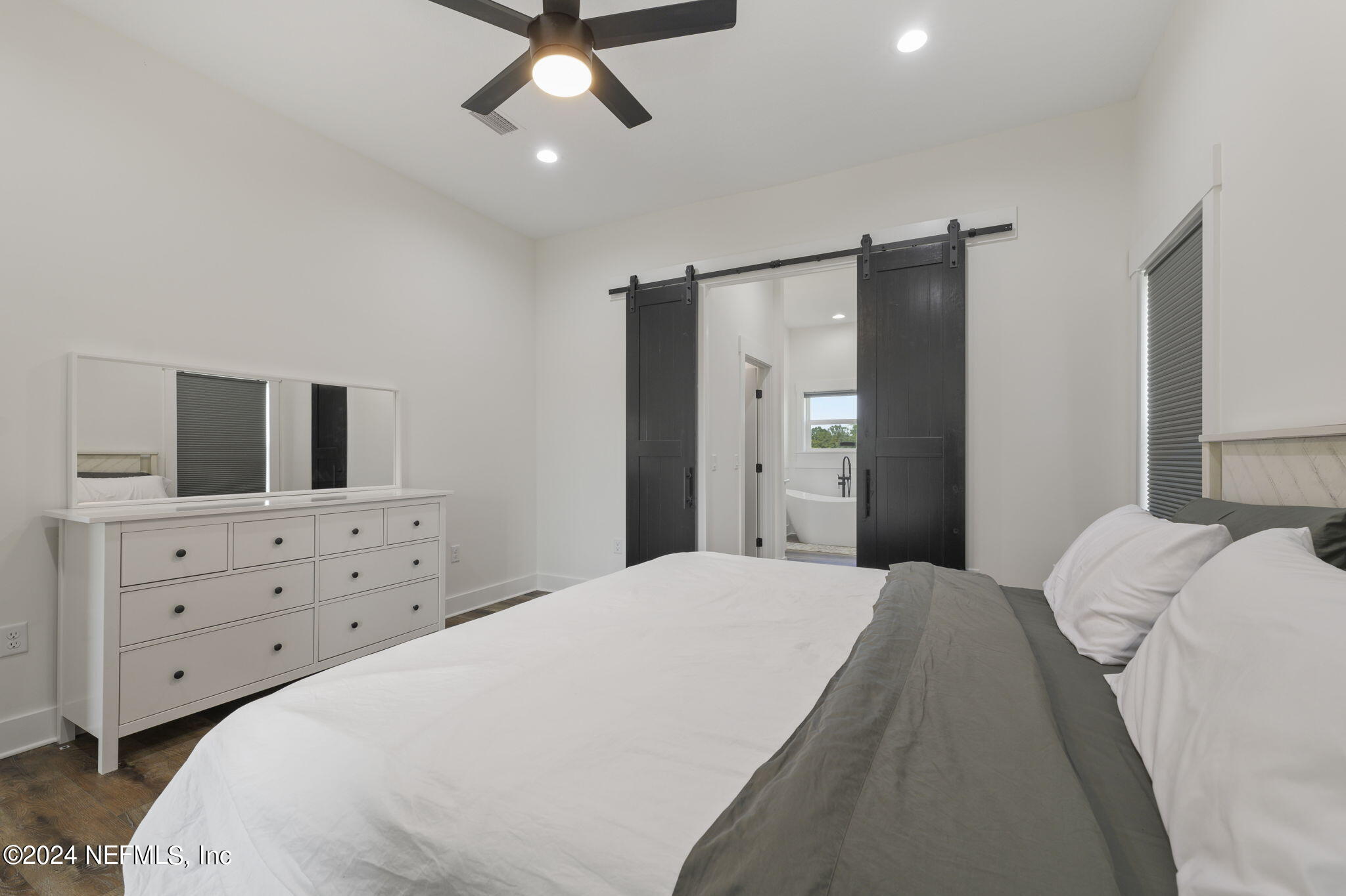 371270 Kings Ferry Road Hilliard, FL 32046 - Photo 13 of 45 Barn doors to ensuite bath