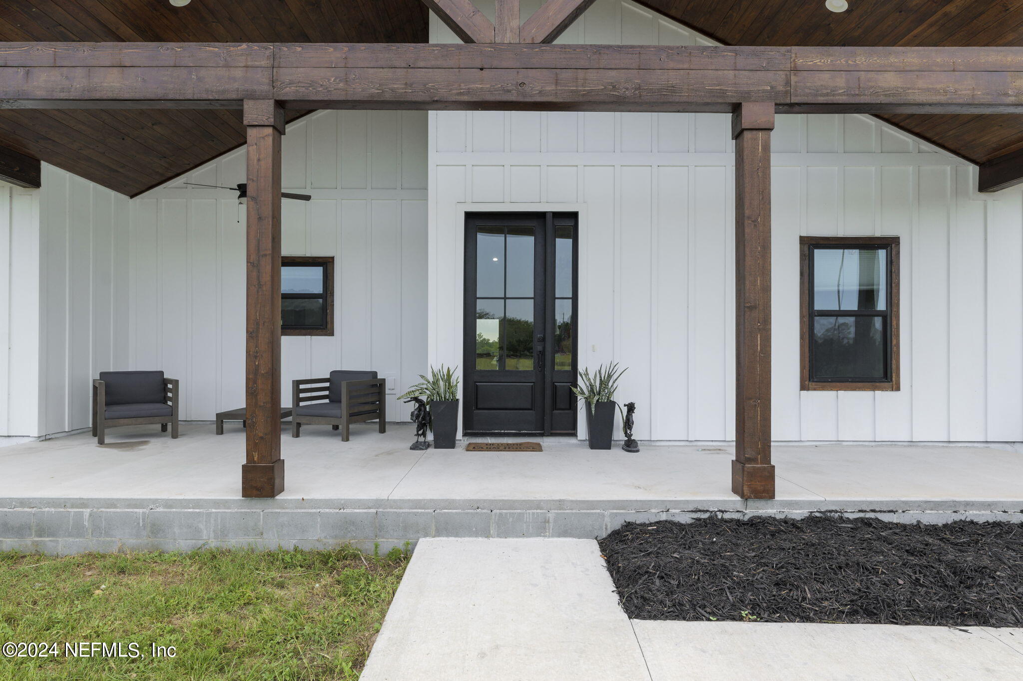 371270 Kings Ferry Road Hilliard, FL 32046 - Photo 3 of 45 Front porch with vaulted ceiling