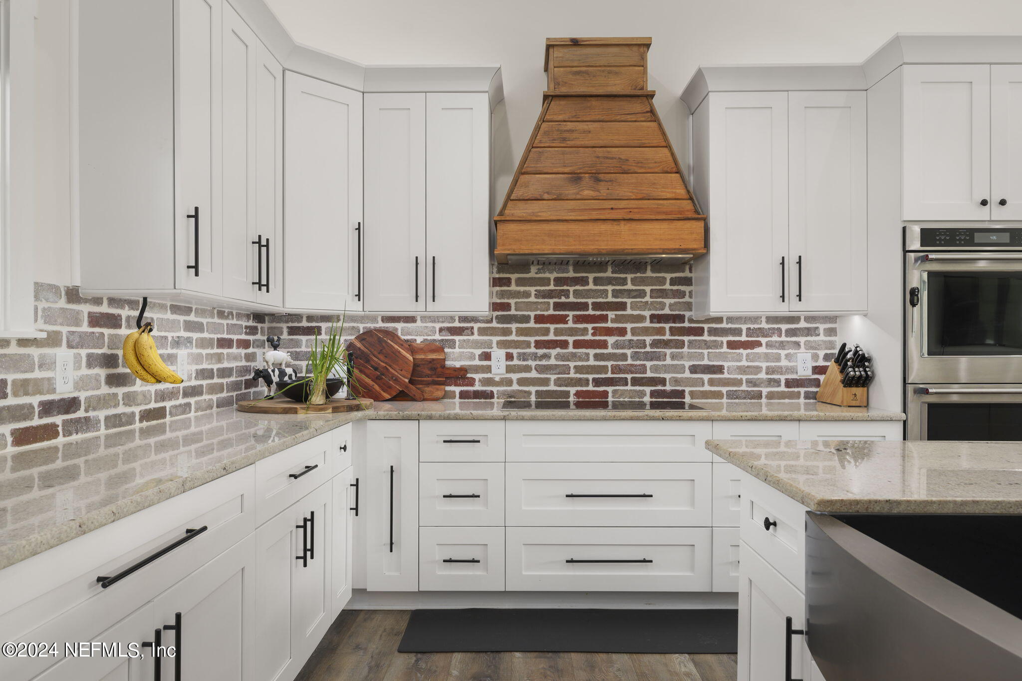 371270 Kings Ferry Road Hilliard, FL 32046 - Photo 7 of 45 Lots of cabinets and brick backsplash