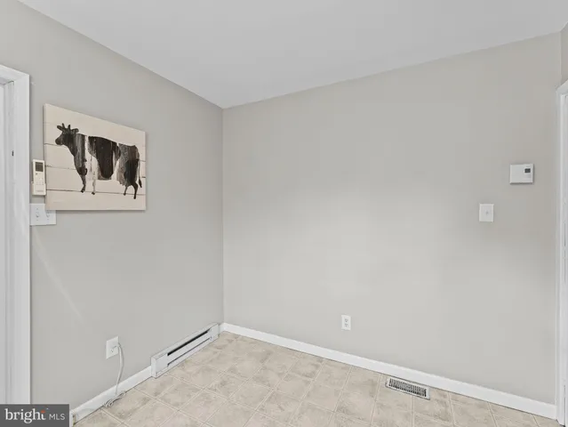 a view of a refrigerator in kitchen