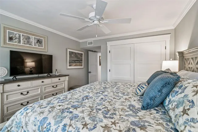 a bathroom with a granite countertop toilet sink and mirror