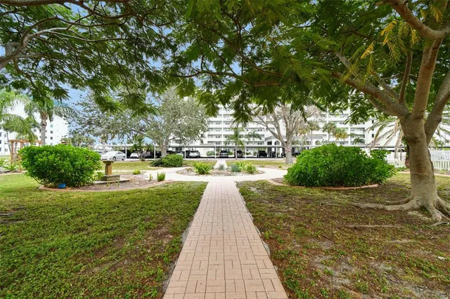 a view of a mini pool with two chairs