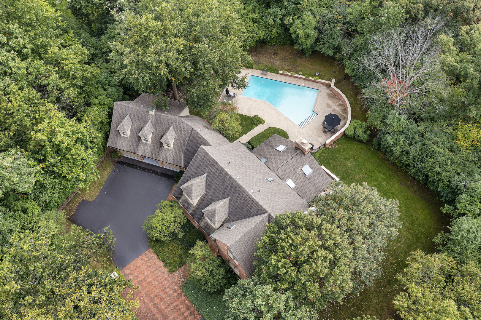 1565 South Ridge Road Lake Forest, IL 60045 - Photo 2 of 26 an aerial view of a house with outdoor space